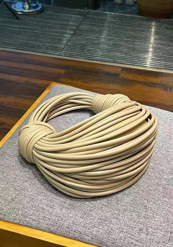 Dina Spaghetti Vegan Leather Knot Top Handle Bag Beige