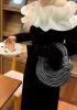 Dina Spaghetti Vegan Leather Knot Top Handle Bag Black