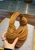 Dina Spaghetti Vegan Leather Knot Top Handle Bag Camel