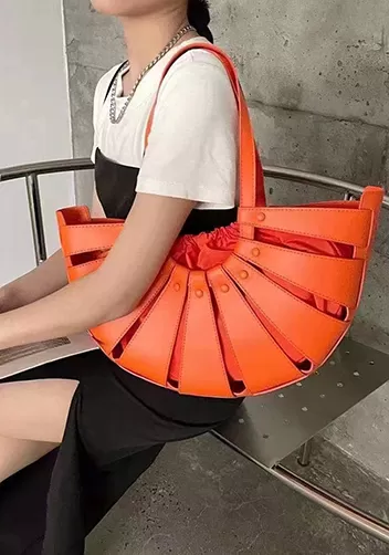The Coquille Vegan Leather Shoulder Bag Orange
